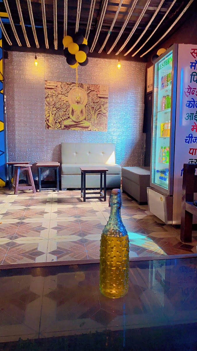 THE CUE LOUNGE AND ROOFTOP CAFE