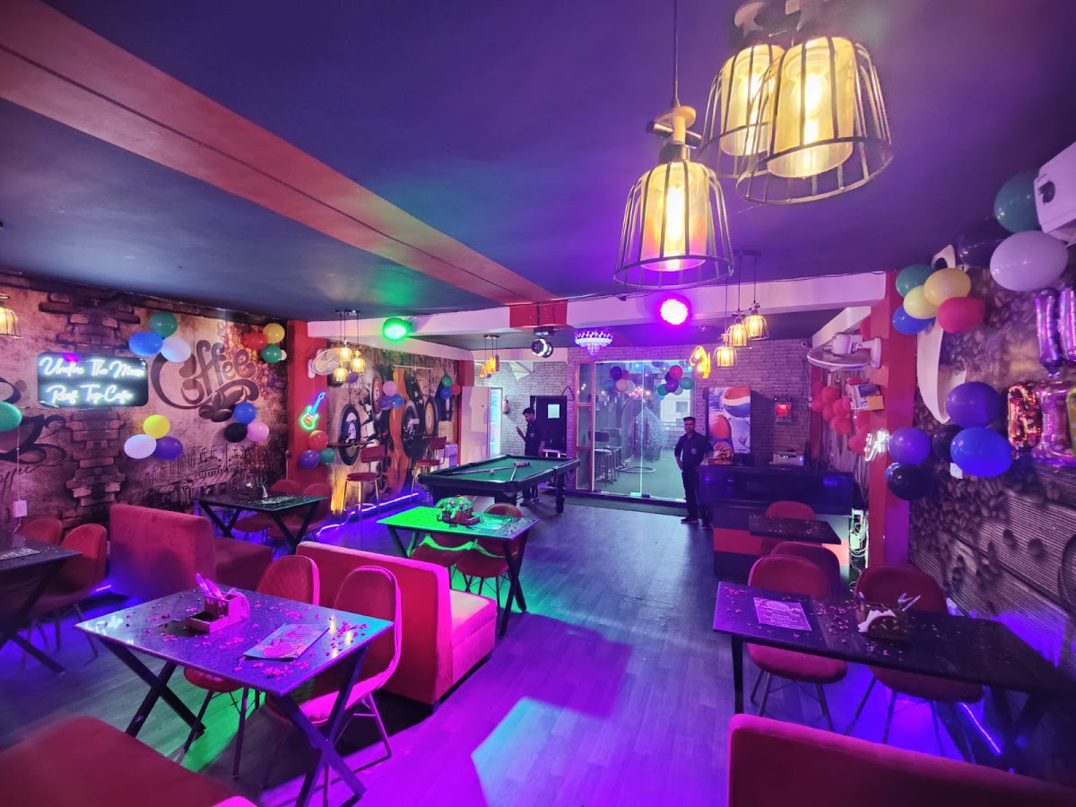 Under The Moon Roof Top Cafe