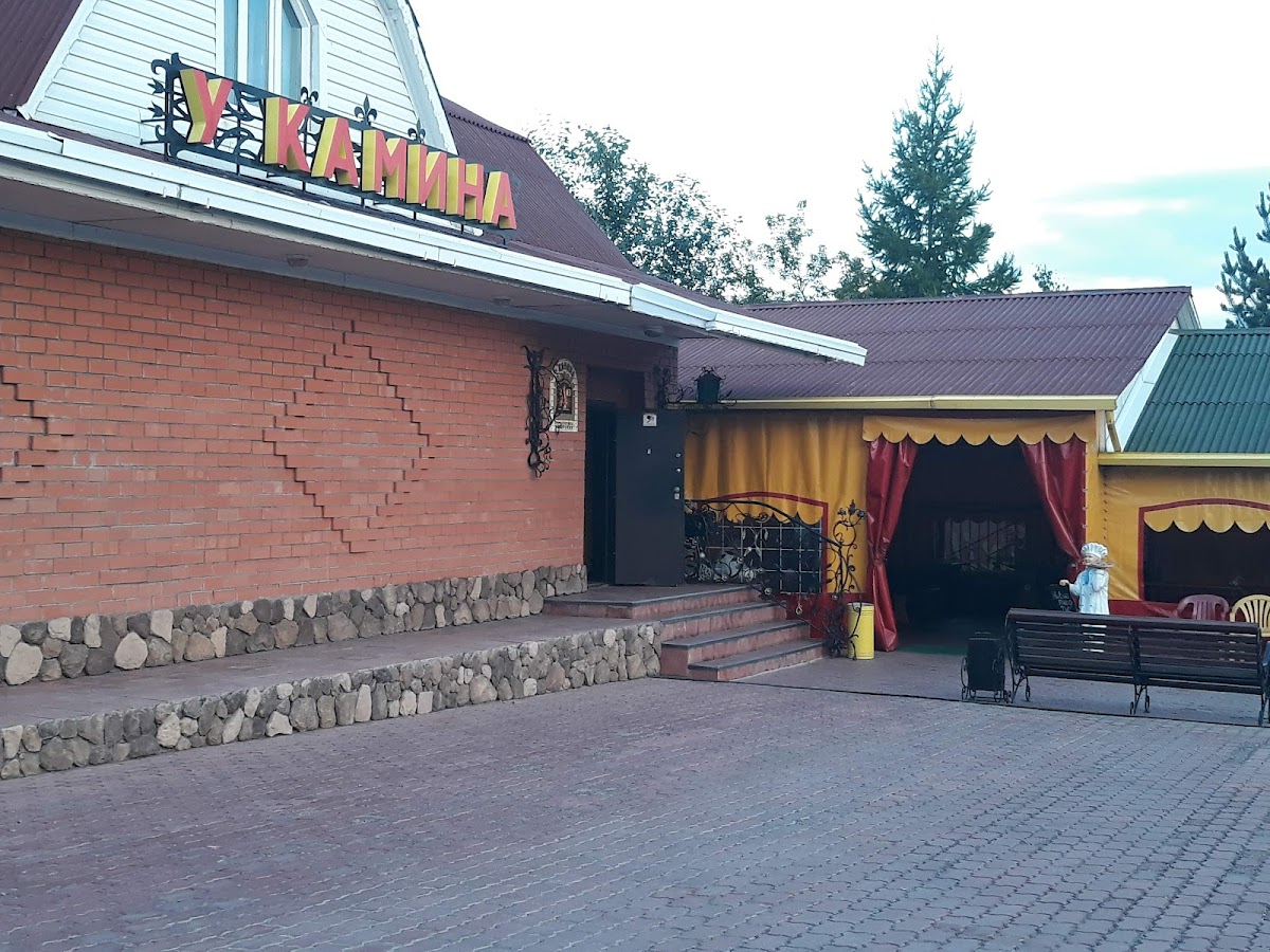 By the fireplace, café